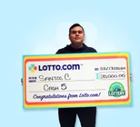 Winner Santos C. holds a check for $20,000 in his hands